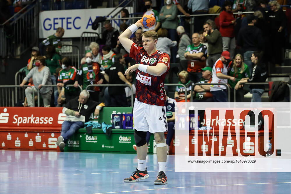 Justus Fischer TSV Hannover Burgdorf,54 Handball Bundesliga season 2021 2022 SC Magdeburg vs TSV Hannover Burgdorf in the GETEC Arena in Magdeburg action,man,men,handball,Germany