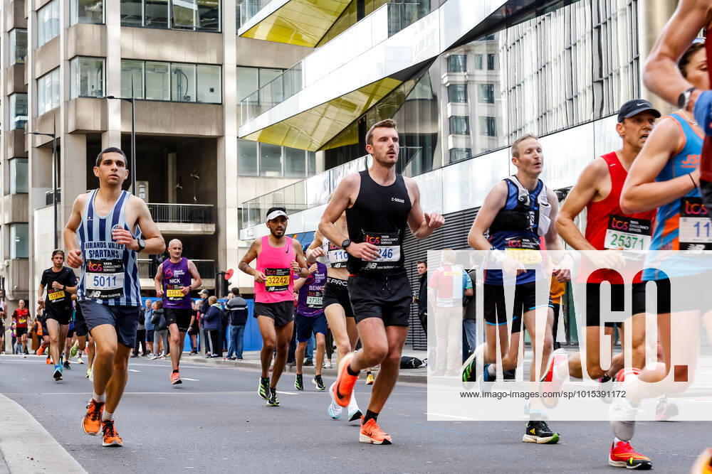 Participants of TCS 2022 London Marathon run through central London. Nearly 42 thousand runners participated in the 2022 competition. London United Kingdom - ZUMAs197 20221002_zaa_s197_266