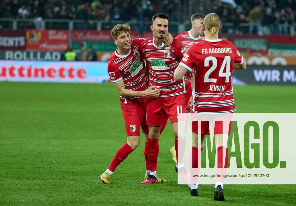 Goal celebration, cheers after his goal for 1 0 by Mergim Berisha FC Augsburg 2 v l , Arne Engels FC Augsburg li and Fredrik Jensen FC Augsburg , FC Augsburg vs Borussia Moenchengladbach, Football, 1 Bundesliga, 17 Spieltag, 25 01 2023 DFB regulations prohibit any use of photographs as image sequences and or quasi video Augsburg Bayern Germany