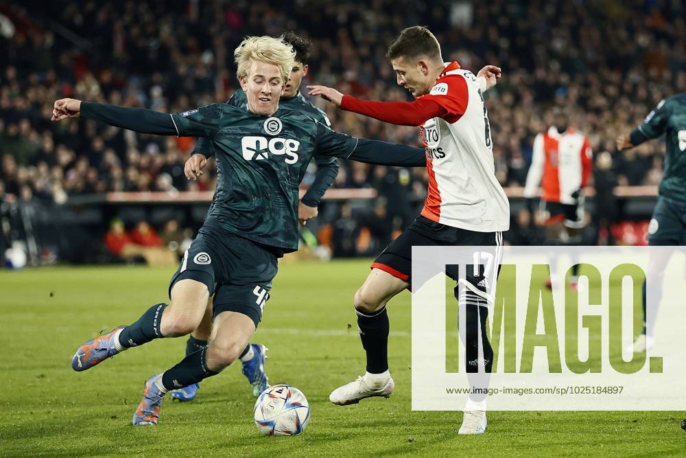 ROTTERDAM - (l-r) Thijmen Blokzijl of FC Groningen, Sebastian Szymanski of Feyenoord during the Dutch premier league match between Feyenoord and FC Groningen at Feyenoord Stadion de Kuip on March 4, 2023 in Rotterdam, Netherlands. ANP PIETER STAM DE JONGE Dutch Eredivisie 2022 2023 ANPxSportx IVx 464171017 originalFilename: 464171017
