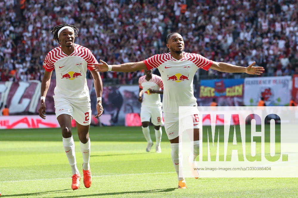 Goal celebration scorer Christopher Nkunku RB Leipzig,18 scores 2 0 1 Football Bundesliga season 2022 2023 point game RB Leipzig vs FC Schalke 04 at Red Bull Arena in Leipzig action,football,Germany,man,men