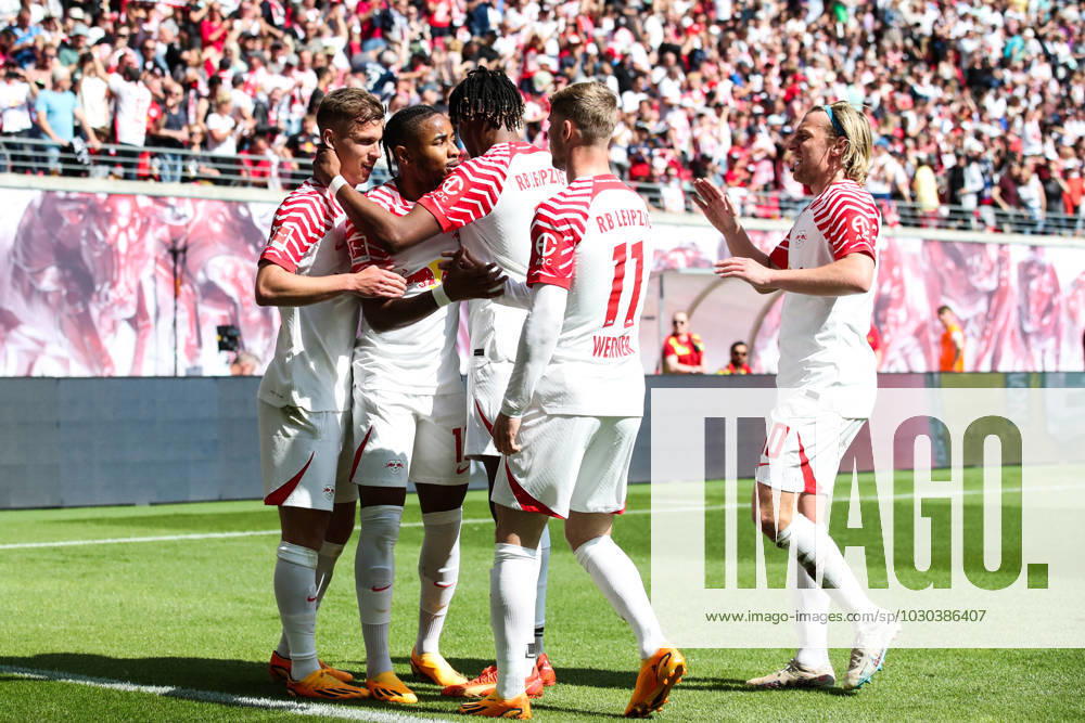 Goal celebration scorer Christopher Nkunku RB Leipzig,18 scores 2 0 1 Football Bundesliga season 2022 2023 point game RB Leipzig vs FC Schalke 04 at Red Bull Arena in Leipzig action,football,Germany,man,men