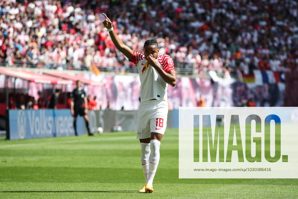 Goal celebration scorer Christopher Nkunku RB Leipzig,18 scores 2 0 1 Football Bundesliga season 2022 2023 point game RB Leipzig vs FC Schalke 04 at Red Bull Arena in Leipzig action,football,Germany,man,men