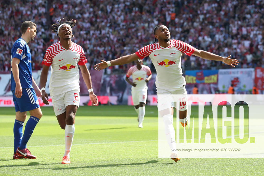 Goal celebration scorer Christopher Nkunku RB Leipzig,18 scores 2 0 1 Football Bundesliga season 2022 2023 point game RB Leipzig vs FC Schalke 04 at Red Bull Arena in Leipzig action,football,Germany,man,men