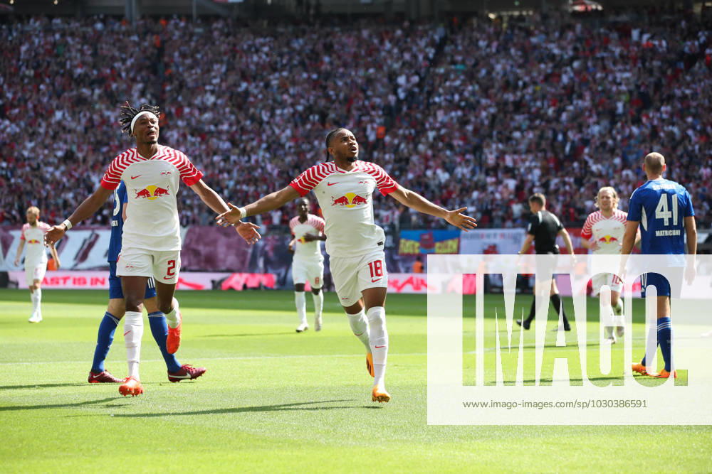 Goal celebration scorer Christopher Nkunku RB Leipzig,18 scores 2 0 1 Football Bundesliga season 2022 2023 point game RB Leipzig vs FC Schalke 04 at Red Bull Arena in Leipzig action,football,Germany,man,men