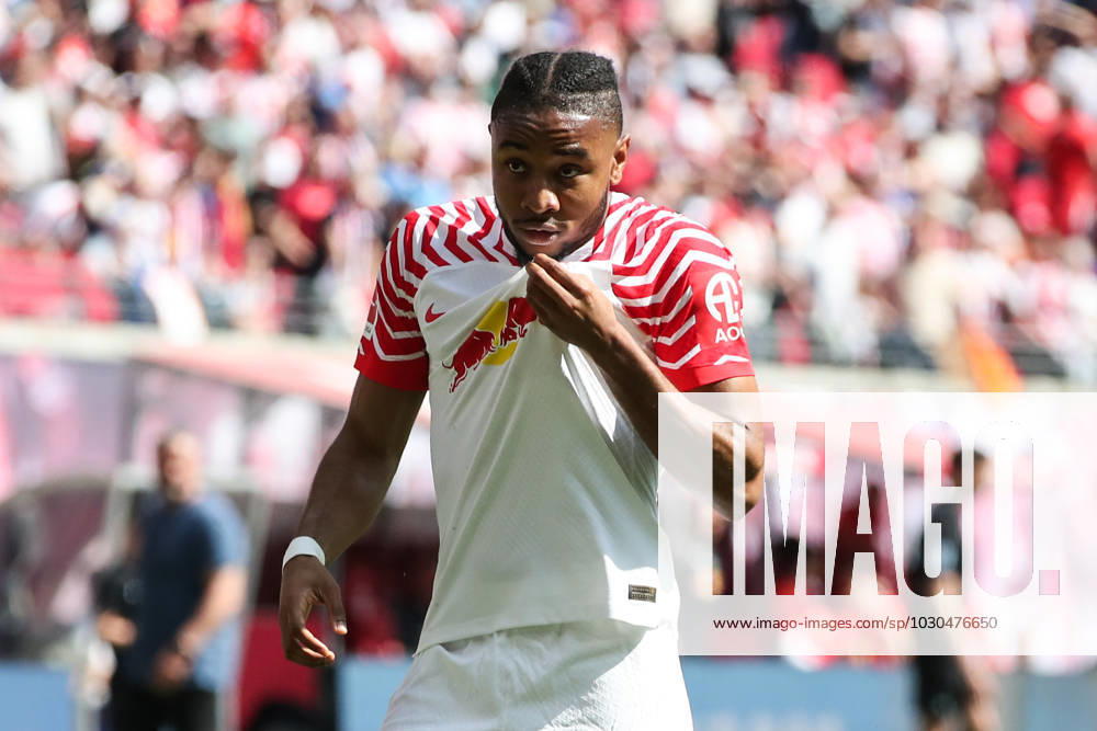 Goal celebration scorer Christopher Nkunku RB Leipzig,18 scores 2 0 1 Football Bundesliga season 2022 2023 point game RB Leipzig vs FC Schalke 04 at Red Bull Arena in Leipzig action,football,Germany,man,men
