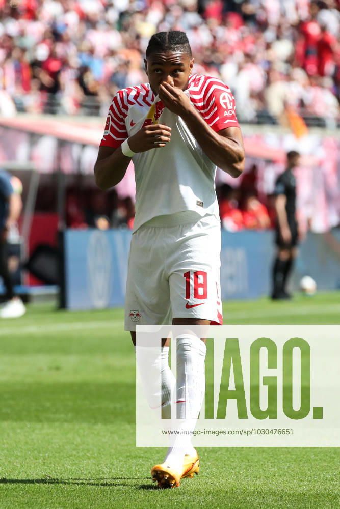 Goal celebration scorer Christopher Nkunku RB Leipzig,18 scores 2 0 1 Football Bundesliga season 2022 2023 point game RB Leipzig vs FC Schalke 04 at Red Bull Arena in Leipzig action,football,Germany,man,men