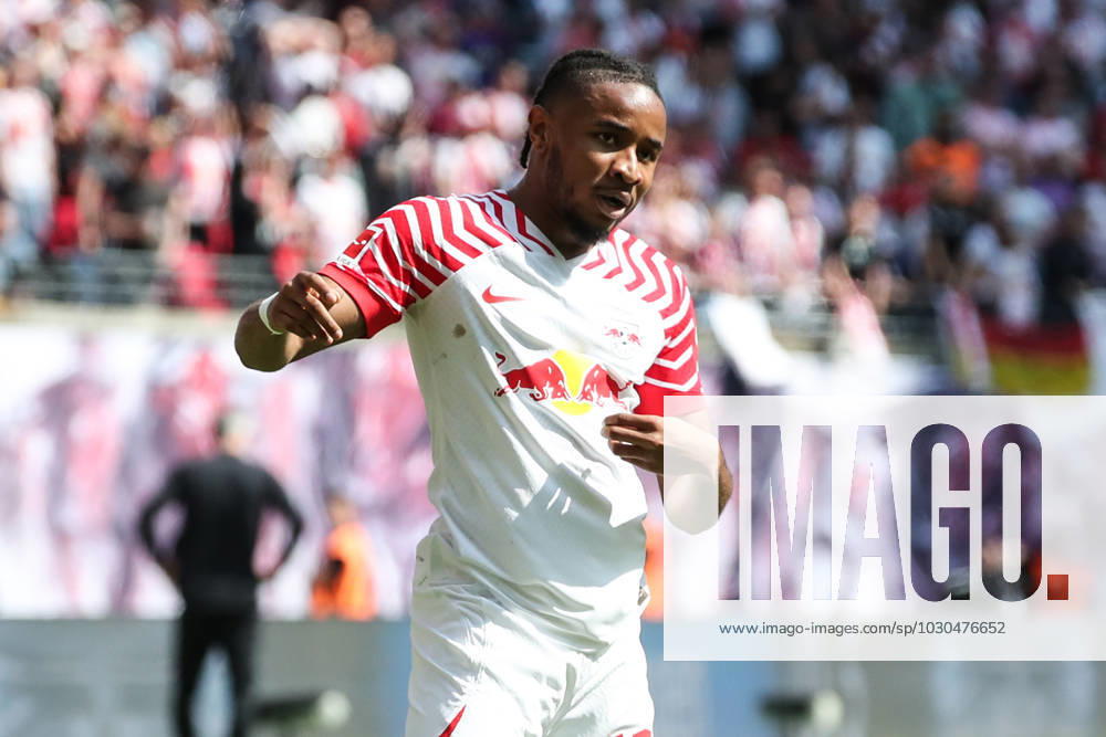Goal celebration scorer Christopher Nkunku RB Leipzig,18 scores 2 0 1 Football Bundesliga season 2022 2023 point game RB Leipzig vs FC Schalke 04 at Red Bull Arena in Leipzig action,football,Germany,man,men