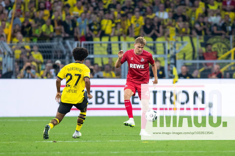 1 Bundesliga, 1 Spieltag Borussia Dortmund 1 FC Koeln, Dortmund, Signal Iduna Park, 19 08 2023 Timo Huebers 1 FC Koeln, 4 , Karim Adeyemi Borussia Dortmund, 27 1 Bundesliga, 1 Spieltag Borussia Dortmund 1 FC Koeln, Dortmund, Signal Iduna Park, 19 08 2023 DFL Regulations prohibit any of use of photographs as image sequences and quasi video