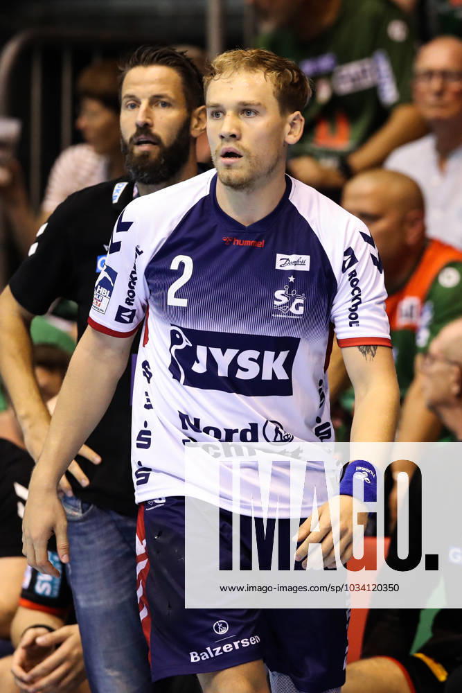 Simon Pytlick SG Flensburg Handewitt,2 and coach Bennet Wiegert SC Magdeburg Handball Bundesliga season 2023 2024 SC Magdeburg vs SG Flensburg Handewitt in the GETEC Arena in Magdeburg Freisteller,Einzelbild,Aktion,Handball,Deutschland
