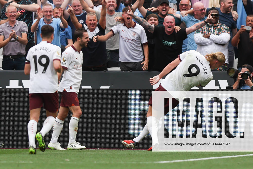 Erling Haland of Manchester City scores to make it 1-3 and celebrates with Bernardo Silva of Manchester City during the Premier League match between West Ham United and Manchester City at the London Stadium, Queen Elizabeth Olympic Park , London, England on 16 September 2023.