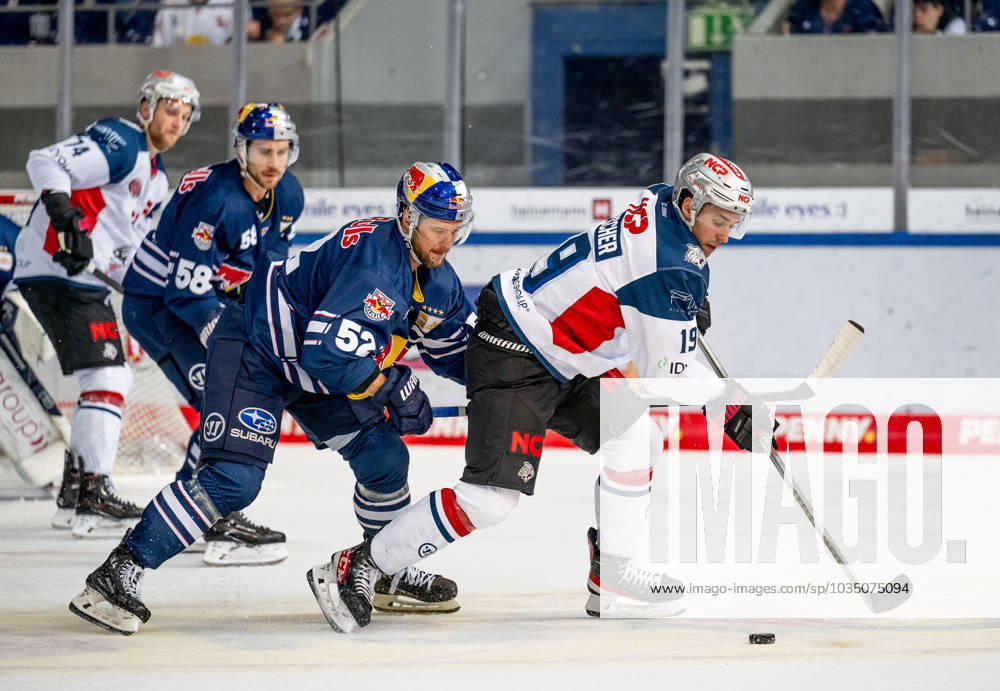 Patrick Hager EHC Red Bull Muenchen, 52 defends against Tim Fleischer Nuernberg Ice Tigers, 19 EHC Red Bull Muenchen vs. Nuernberg Ice Tigers, Ice Hockey, DEL, 7 Spieltag, Saison 2023 2024, 03 10 2023 EHC Red Bull Muenchen vs. Nuernberg Ice Tigers, Ice Hockey, DEL, 7 Spieltag, Saison 2023 2024, 03 10 2023 Muenchen