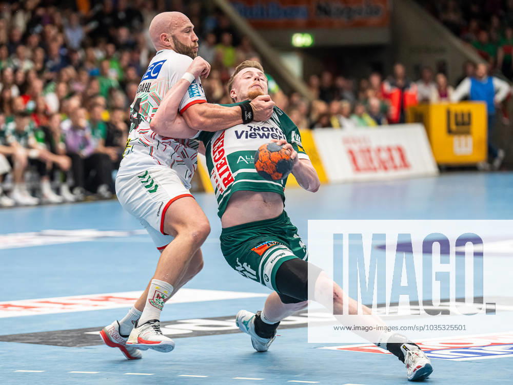 Erik Persson Frisch Auf Goeppingen, 22 in duel with Oscar Bergendahl SC Magdeburg, 54 , Frisch Auf Goeppingen vs SC Magdeburg, 1 Bundesliga, Handball, Men, 07 10 2023 Frisch Auf Goeppingen vs SC Magdeburg, 1 Bundesliga, Handball, Men, 07 10 2023 Goeppingen