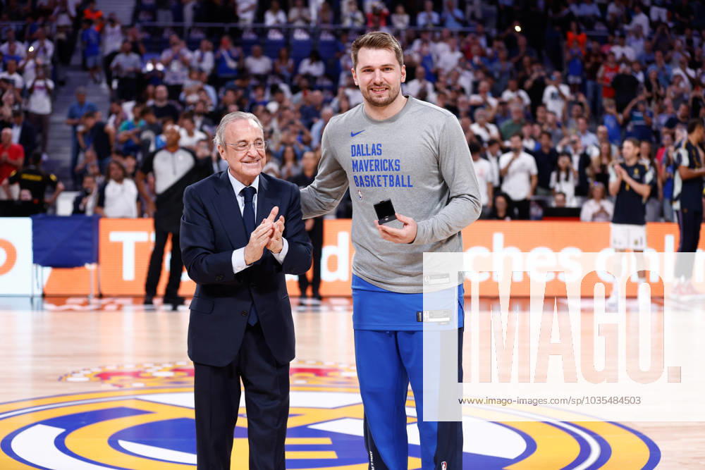 Florentino Perez, President of Real Madrid, gives a present to Luka Doncic of Dallas Mavericks during the basketball friendly match played between Real Madrid and Dallas Mavericks at Wizink Center pavilion on October 10, 2023, in Madrid, Spain. MADRID SPAIN - ZUMAa181 20231010_zaa_a181_032