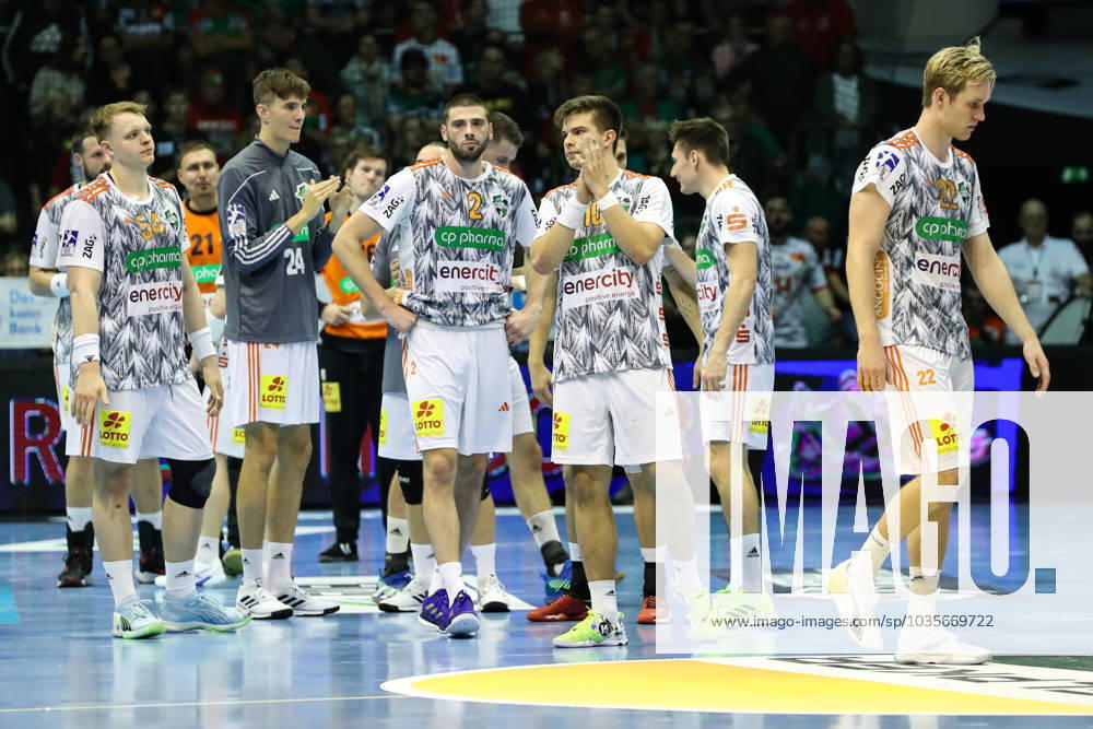 Renars Uscins TSV Hannover Burgdorf,10 Disappointed, the players of TSV Hannover Burgdorf after the end of the game Handball Bundesliga season 2023 2024 SC Magdeburg vs TSV Hannover Burgdorf at the GETEC Arena in Magdeburg Action,Handball,Germany