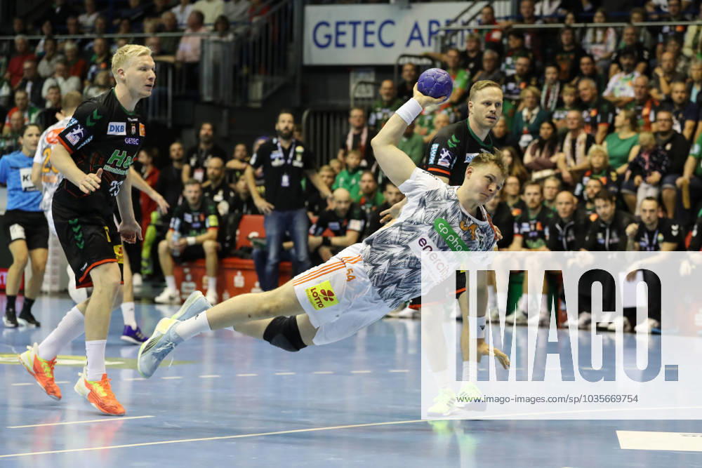 Justus Fischer TSV Hannover Burgdorf,54 Handball Bundesliga Season 2023 2024 SC Magdeburg vs TSV Hannover Burgdorf in the GETEC Arena in Magdeburg Action,Handball,Germany