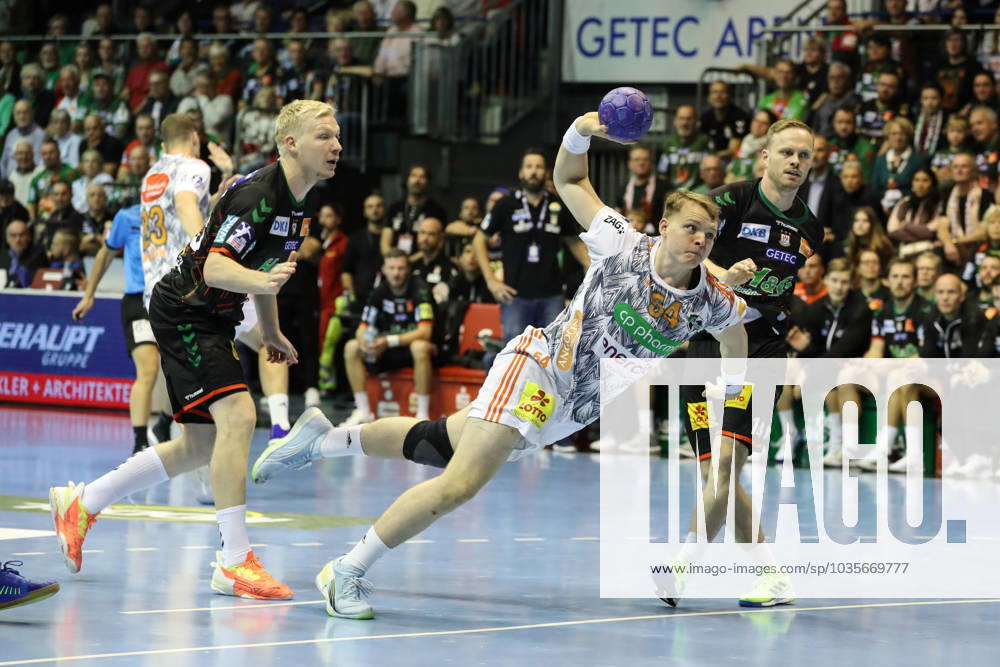 Justus Fischer TSV Hannover Burgdorf,54 Handball Bundesliga Season 2023 2024 SC Magdeburg vs TSV Hannover Burgdorf in the GETEC Arena in Magdeburg Action,Handball,Germany