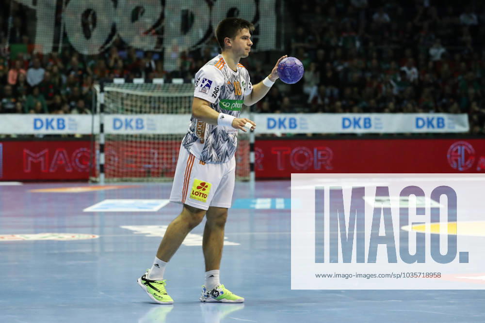 Renars Uscins TSV Hannover Burgdorf,10 Handball Bundesliga season 2023 2024 SC Magdeburg vs TSV Hannover Burgdorf in the GETEC Arena in Magdeburg punter,action,handball,Germany
