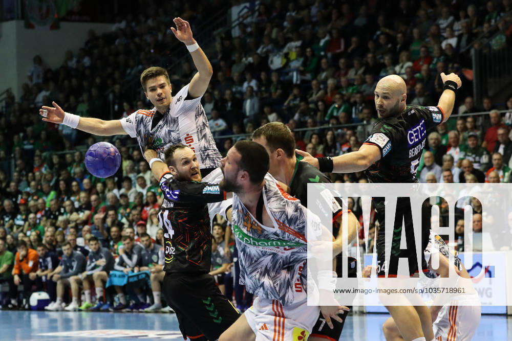 Renars Uscins TSV Hannover Burgdorf,10 and Ilija Brozovic TSV Hannover Burgdorf,44 against Christian O Sullivan SC Magdeburg,24 and Oscar Bergendahl SC Magdeburg,54 Handball Bundesliga Season 2023 2024 SC Magdeburg vs TSV Hannover Burgdorf at GETEC Arena in Magdeburg Action,Handball,Germany