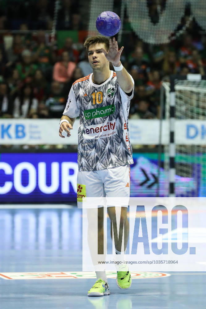 Renars Uscins TSV Hannover Burgdorf,10 Handball Bundesliga season 2023 2024 SC Magdeburg vs TSV Hannover Burgdorf in the GETEC Arena in Magdeburg punter,action,handball,Germany