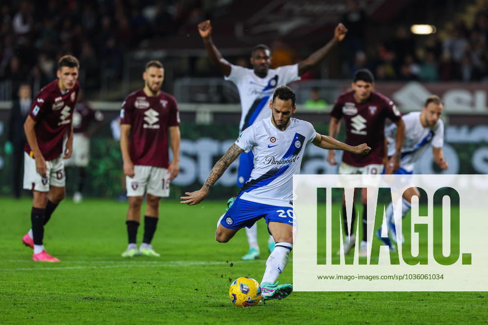 Hakan Calhanoglu of FC Internazionale scores a penalty during Serie A 2023 24 football match between Torino FC and FC Internazionale at Stadio Olimpico Grande Torino, Turin, Italy on October 21, 2023 - Turin Stadio Olimpico Torino Turin Italy