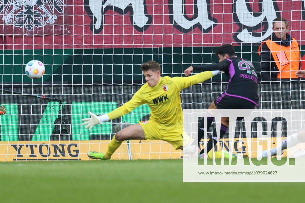 Aleksandar Pavlovic FC Bayern Munich scores to 0 1 against Finn Dahmen Goalkeeper FC Augsburg 1 FC Augsburg vs FC Bayern Munich, Matchday 19 DFL REGULATIONS PROHIBIT ANY USE OF PHOTOGRAPHS AS IMAGE SEQUENCES AND OR QUASI VIDEO