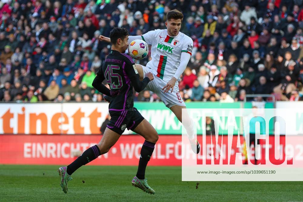 In duel, action, with Alexandar Pavlovic 45 FC Bayern Muenchen , Elvis Rexhbecaj 8 FC Augsburg , FC Augsburg vs FC Bayern Muenchen, Soccer, 1 Bundesliga, 19 Matchday, 27 01 2024 DFB regulations prohibit any use of photographs as image sequences and or quasi video Augsburg Bayern Germany