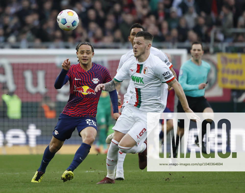Soccer 1 Bundesliga, 21 Matchday FC Augsburg RB Leipzig, 2023 2024, in the WWK Arena Augsburg from left Xavi Simons RB Leipzig , Felix Uduokhai FC Augsburg and Jeffrey Gouweleeuw FC Augsburg For journalistic purposes only Only for editorial use DFL regulations prohibit any use of photographs as image sequences and or quasi video