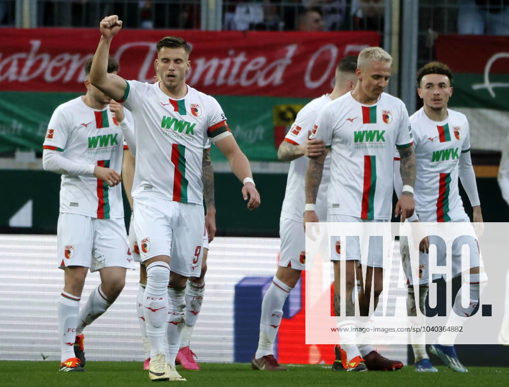Soccer 1 Bundesliga, 21 Matchday FC Augsburg RB Leipzig, 2023 2024, in the WWK Arena Augsburg from left Dion Drena Beljo FC Augsburg , Ermedin Demirovic FC Augsburg cheers, Jeffrey Gouweleeuw FC Augsburg , Philip Tietz FC Augsburg and Ruben Vargas FC Augsburg For journalistic purposes only Only for editorial use DFL regulations prohibit any use of photographs as image sequences and or quasi video
