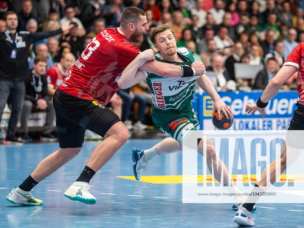 Erik Persson Frisch Auf Goeppingen, 22 in duel with Mijajlo Marsenic Fuechse Berlin, 93 , Frisch Auf Goeppingen vs Fuechse Berlin, 1 Bundesliga, Handball, Men, 04 04 2024 Frisch Auf Goeppingen vs Fuechse Berlin, 1 Bundesliga, Handball, Men, 04 04 2024 Goeppingen
