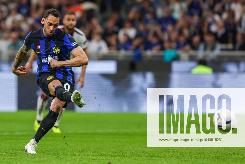 Hakan Calhanoglu of FC Internazionale scores a penalty during Serie A 2023 24 football match between FC Internazionale and Cagliari Calcio at Giuseppe Meazza Stadium, Milan, Italy on April 14, 2024 - Milan Stadio Giuseppe Meazza Milan Italy