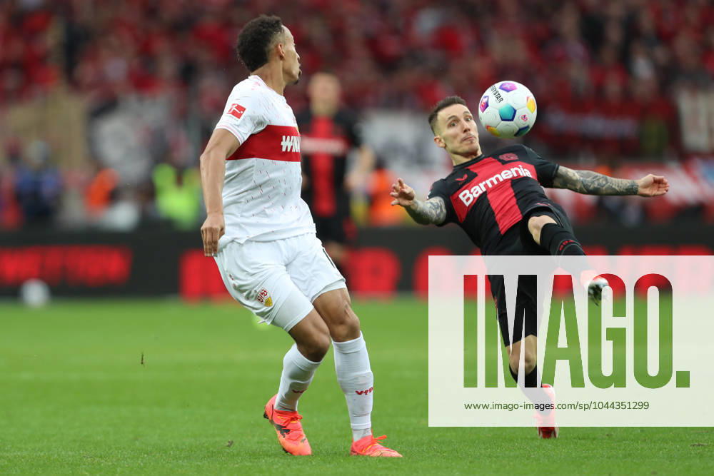 Jamie Leweling VfB Stuttgart and Alejandro Grimaldo Bayer 04 Leverkusen in a duel, 1 Bundesliga, Bayer 04 Leverkusen vs VfB Stuttgart, BayArena on April 27, 2024 in Leverkusen, Germany Photo by Oliver Kaelke DeFodi Images Jamie Leweling VfB Stuttgart and Alejandro Grimaldo Bayer 04 Leverkusen battle for the ball, 1 Bundesliga, Bayer 04 Leverkusen vs VfB Stuttgart, BayArena on April 27, 2024 in Leverkusen, Germany Photo by Oliver Kaelke DeFodi Images Defodi 678 2024 04 27 OK LEVVFB 0992 Defodi-678