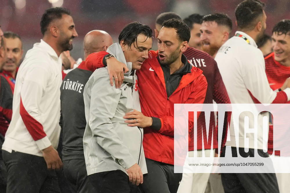 Turkey s Hakan Calhanoglu and Turkey s head coach Vincenzo Montella final celebration during the Euro 2024 soccer match between Austria and Turkey at the Red Bull Arena -Round of 16, Leipzig, Germany - Tuesday July 02, 2024. - Soccer .