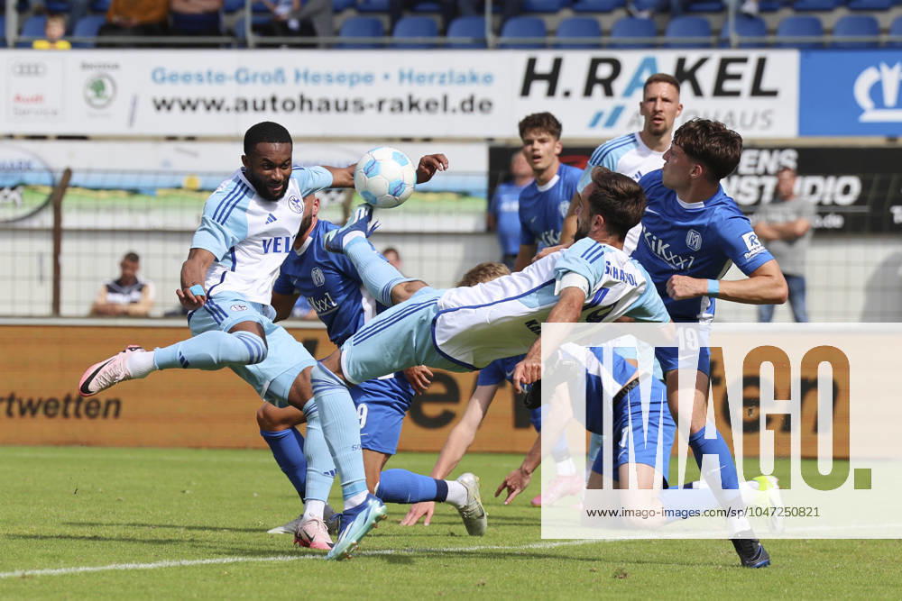 Moussa Sylla FC Schalke 04 , Kenan Karaman FC Schalke 04 and Luis Sprekelmeyer SV Meppen battle for the ball, Nevernot Cup, SV Meppen vs FC Schalke 04, Haensch Arena on July 06, 2024 in Meppen, Germany Photo by Marco Steinbrenner DeFodi Images Moussa Sylla FC Schalke 04 , Kenan Karaman FC Schalke 04 and Luis Sprekelmeyer SV Meppen battle for the ball, Nevernot Cup, SV Meppen vs FC Schalke 04, Haensch Arena, July 6, 2024 in Meppen, Germany Photo by Marco Steinbrenner DeFodi Images Defodi 700 meppen schalke 20240706 051 Defodi-700