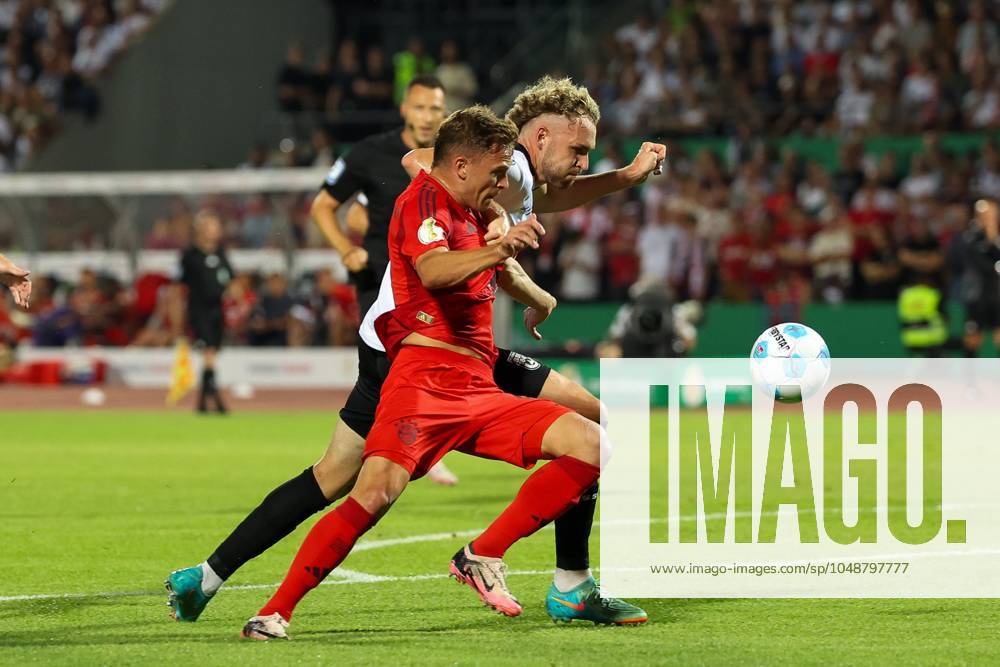 In duel, action, with Joshua Kimmich 6 FC Bayern Muenchen , Philipp Strompf 32 SSV Ulm 1846 , SSV Ulm 1846 vs FC Bayern Muenchen, Football, DFB Pokal, 1 Runde, 16 08 2024 DFB regulations prohibit any use of photographs as image sequences and or quasi video Ulm Baden Wuerttemberg Germany