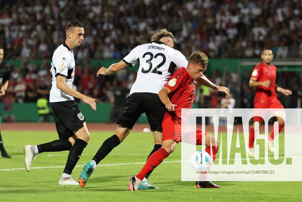 In duel, action, with Joshua Kimmich 6 FC Bayern Muenchen , Philipp Strompf 32 SSV Ulm 1846 , SSV Ulm 1846 vs FC Bayern Muenchen, Football, DFB Pokal, 1 Runde, 16 08 2024 DFB regulations prohibit any use of photographs as image sequences and or quasi video Ulm Baden Wuerttemberg Germany
