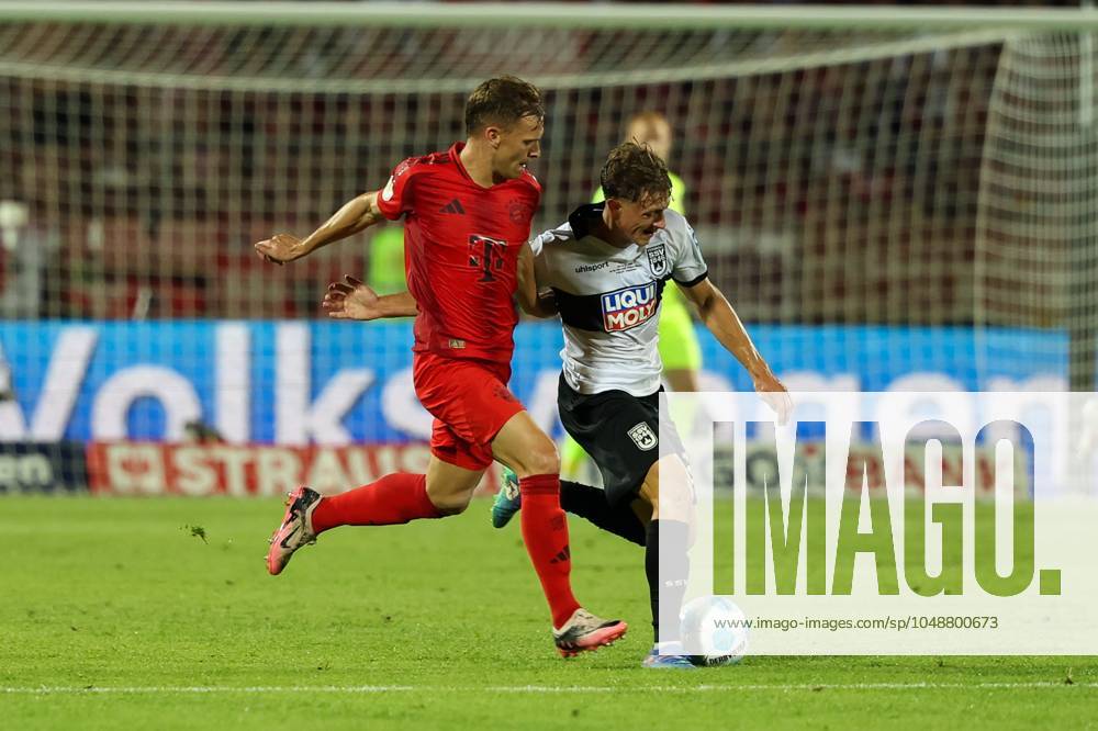 In duel, action, with Joshua Kimmich 6 FC Bayern Muenchen , Maurice Krattenmacher 30 SSV Ulm 1846 , SSV Ulm 1846 vs FC Bayern Muenchen, Football, DFB Pokal, 1 Runde, 16 08 2024 DFB regulations prohibit any use of photographs as image sequences and or quasi video Ulm Baden Wuerttemberg Germany