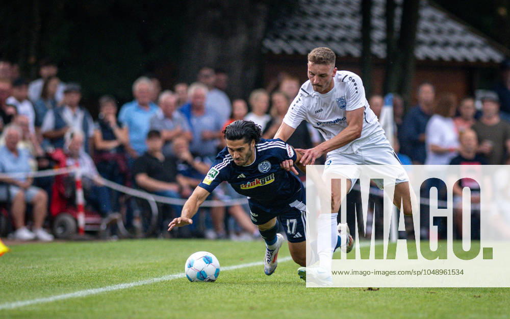 Soccer, Season 2024 2025, Niederrheinpokal 20 08 2023, 01 Round, Men, BW Dingden white vs MSV Duisburg black v l Mert Goeckan MSV Duisburg , Lasse Hoffmann BW Dingden , Hamminkeln Sportanlage BW Dingden Nordrhein Westfalen Germany 240820_fb_bw-dingden_msv-duisburg_32310