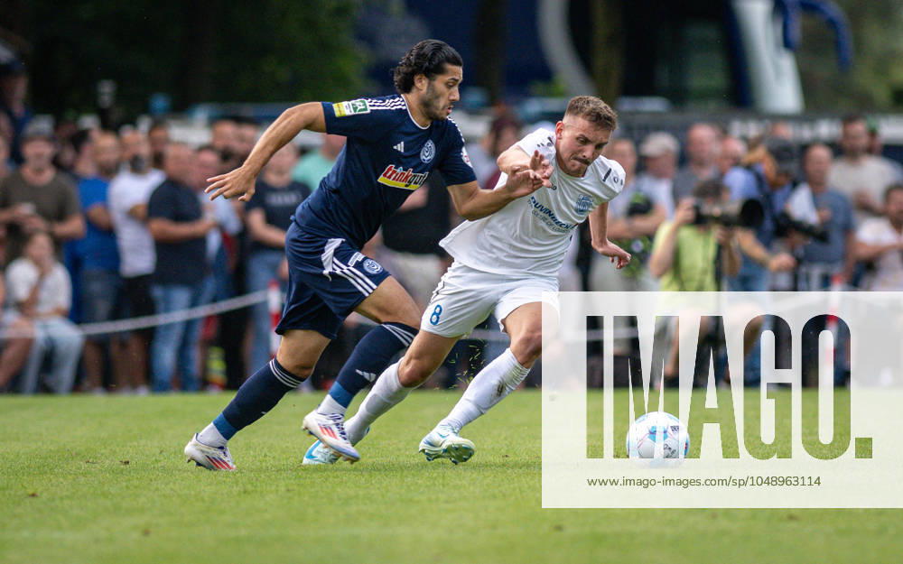 Soccer, Season 2024 2025, Niederrheinpokal 20 08 2023, 01 Round, Men, BW Dingden white vs MSV Duisburg black v l Mert Goeckan MSV Duisburg , Lasse Hoffmann BW Dingden , Hamminkeln Sportanlage BW Dingden Nordrhein Westfalen Germany 240820_fb_bw-dingden_msv-duisburg_32300