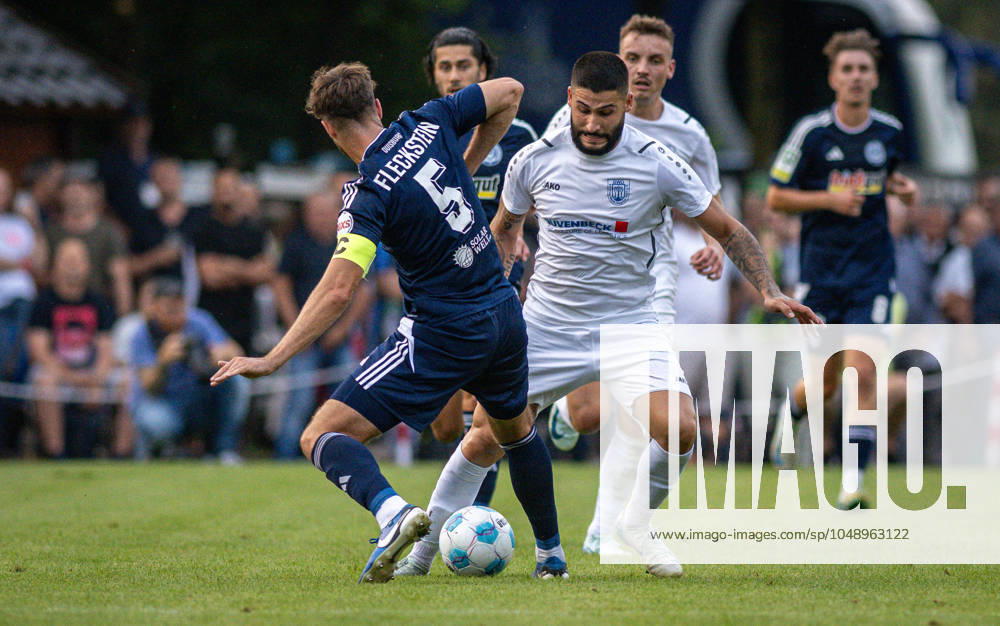 Soccer, Season 2024 2025, Niederrheinpokal 20 08 2023, 01 Round, Men, BW Dingden white vs MSV Duisburg black v l Tobias Fleckstein MSV Duisburg , Mohamed Salman BW Dingden , Hamminkeln Sportanlage BW Dingden Nordrhein Westfalen Germany 240820_fb_bw-dingden_msv-duisburg_32327