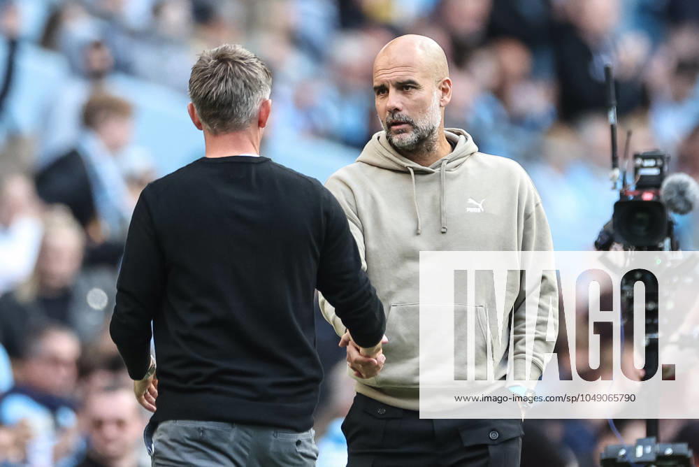 Premier League Manchester City v Ipswich Town Pep Guardiola manager of Manchester City shakes hands with Kieran McKenna manager of Ipswich Town after the game during the Premier League match Manchester City vs Ipswich Town at Etihad Stadium, Manchester, United Kingdom, 24th August 2024 (Photo by Mark Cosgrove News Images) Manchester Etihad Stadium Manchester United, ManU Kingdom