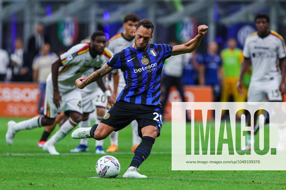 Hakan Calhanoglu of FC Internazionale scores a penalty during Serie A 2024 25 football match between FC Internazionale and US Lecce at Giuseppe Meazza Stadium, Milan, Italy on August 24, 2024 - Milan Stadio Giuseppe Meazza Milan Italy