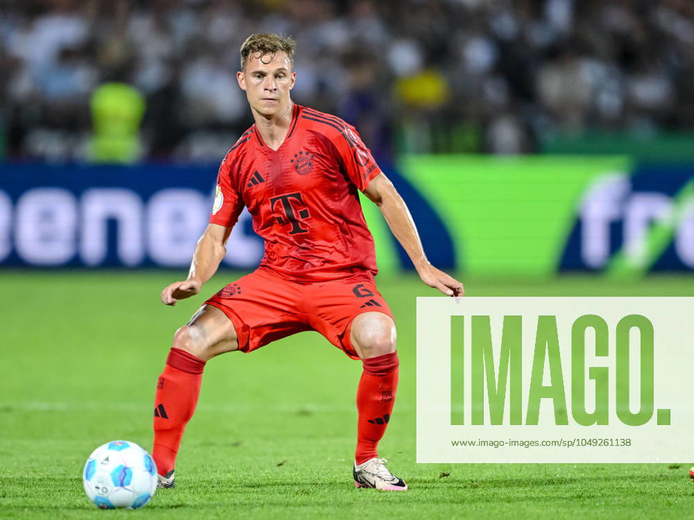 Joshua Kimmich FC Bayern Muenchen in action, on the ball, single action during the DFB Pokal First Round match between SSV Ulm 1846 Fussball and FC Bayern Muenchen at Donaustadion on August 16, 2024 in Ulm, Germany Photo by Harry Langer DeFodi Images Joshua Kimmich FC Bayern Muenchen controls the Ball during the DFB Pokal First Round match between SSV Ulm 1846 Fussball and FC Bayern Muenchen at Donaustadion on August 16, 2024 in Ulm, Germany Photo by Harry Langer DeFodi Images DFB DFL REGULATIONS PROHIBIT ANY USE OF PHOTOGRAPHS AS IMAGE SEQUENCES AND OR QUASI VIDEO Photo by Harry Langer DeFodi Images DFB DFL REGULATIONS PROHIBIT ANY USE OF PHOTOGRAPHS AS IMAGE SEQUENCES AND OR QUASI VIDEO Defodi 541 SSVFCB240816 207 Defodi-541 DFB DFL REGULATIONS PROHIBIT ANY USE OF PHOTOGRAPHS AS IMAGE SEQUENCES AND OR QUASI-VIDEO.