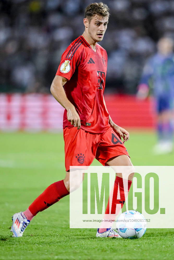 Josip Stanisic FC Bayern Muenchen in action, on the ball, single action during the DFB Pokal First Round match between SSV Ulm 1846 Fussball and FC Bayern Muenchen at Donaustadion on August 16, 2024 in Ulm, Germany Photo by Harry Langer DeFodi Images Josip Stanisic FC Bayern Muenchen controls the Ball during the DFB Pokal First Round match between SSV Ulm 1846 Fussball and FC Bayern Muenchen at Donaustadion on August 16, 2024 in Ulm, Germany Photo by Harry Langer DeFodi Images DFB DFL REGULATIONS PROHIBIT ANY USE OF PHOTOGRAPHS AS IMAGE SEQUENCES AND OR QUASI VIDEO Photo by Harry Langer DeFodi Images DFB DFL REGULATIONS PROHIBIT ANY USE OF PHOTOGRAPHS AS IMAGE SEQUENCES AND OR QUASI VIDEO Defodi 541 SSVFCB240816 227 Defodi-541 DFB DFL REGULATIONS PROHIBIT ANY USE OF PHOTOGRAPHS AS IMAGE SEQUENCES AND OR QUASI-VIDEO.
