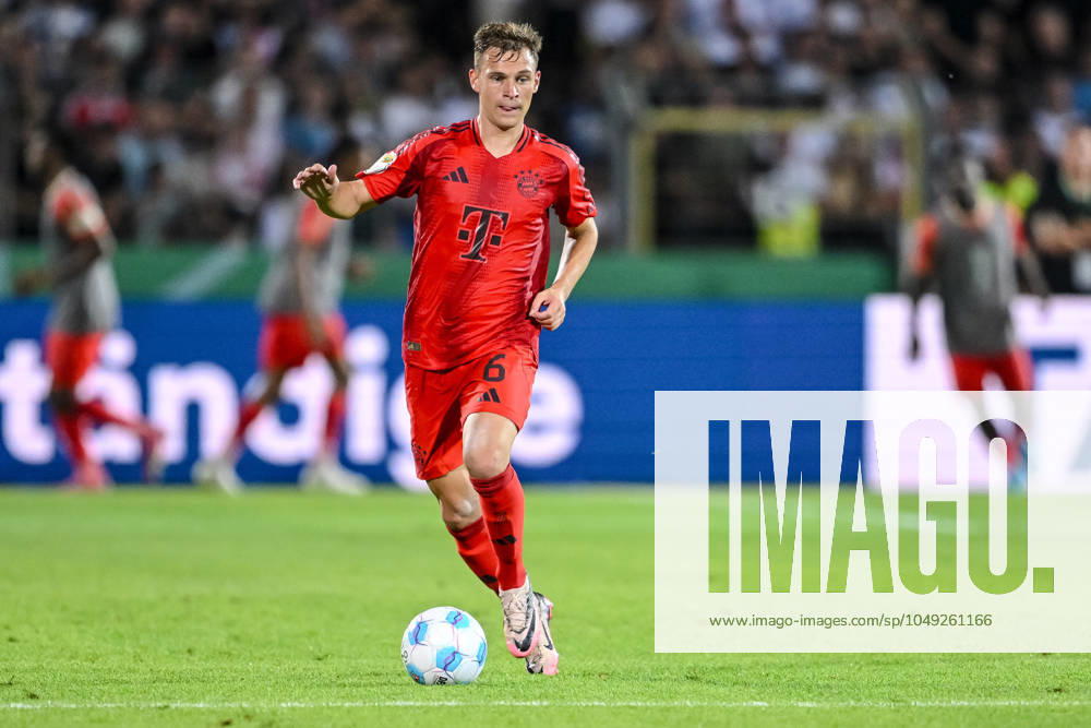 Joshua Kimmich FC Bayern Muenchen in action, on the ball, single action during the DFB Pokal First Round match between SSV Ulm 1846 Fussball and FC Bayern Muenchen at Donaustadion on August 16, 2024 in Ulm, Germany Photo by Harry Langer DeFodi Images Joshua Kimmich FC Bayern Muenchen controls the Ball during the DFB Pokal First Round match between SSV Ulm 1846 Fussball and FC Bayern Muenchen at Donaustadion on August 16, 2024 in Ulm, Germany Photo by Harry Langer DeFodi Images DFB DFL REGULATIONS PROHIBIT ANY USE OF PHOTOGRAPHS AS IMAGE SEQUENCES AND OR QUASI VIDEO Photo by Harry Langer DeFodi Images DFB DFL REGULATIONS PROHIBIT ANY USE OF PHOTOGRAPHS AS IMAGE SEQUENCES AND OR QUASI VIDEO Defodi 541 SSVFCB240816 261 Defodi-541 DFB DFL REGULATIONS PROHIBIT ANY USE OF PHOTOGRAPHS AS IMAGE SEQUENCES AND OR QUASI-VIDEO.