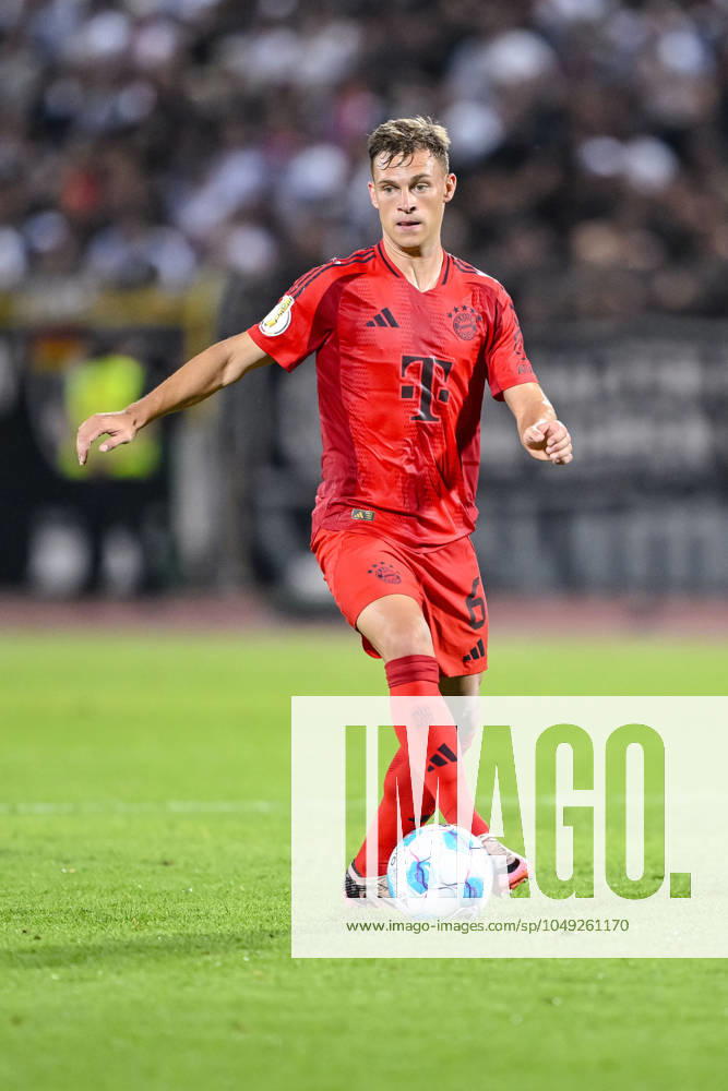 Joshua Kimmich FC Bayern Muenchen in action, on the ball, single action during the DFB Pokal First Round match between SSV Ulm 1846 Fussball and FC Bayern Muenchen at Donaustadion on August 16, 2024 in Ulm, Germany Photo by Harry Langer DeFodi Images Joshua Kimmich FC Bayern Muenchen controls the Ball during the DFB Pokal First Round match between SSV Ulm 1846 Fussball and FC Bayern Muenchen at Donaustadion on August 16, 2024 in Ulm, Germany Photo by Harry Langer DeFodi Images DFB DFL REGULATIONS PROHIBIT ANY USE OF PHOTOGRAPHS AS IMAGE SEQUENCES AND OR QUASI VIDEO Photo by Harry Langer DeFodi Images DFB DFL REGULATIONS PROHIBIT ANY USE OF PHOTOGRAPHS AS IMAGE SEQUENCES AND OR QUASI VIDEO Defodi 541 SSVFCB240816 263 Defodi-541 DFB DFL REGULATIONS PROHIBIT ANY USE OF PHOTOGRAPHS AS IMAGE SEQUENCES AND OR QUASI-VIDEO.
