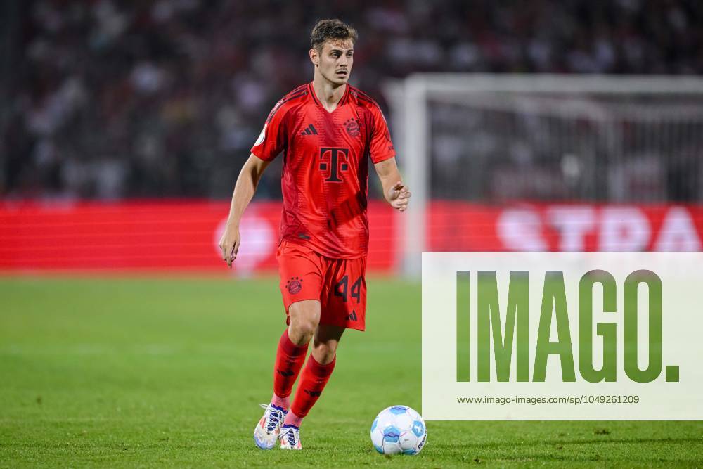 Josip Stanisic FC Bayern Muenchen in action, on the ball, single action during the DFB Pokal First Round match between SSV Ulm 1846 Fussball and FC Bayern Muenchen at Donaustadion on August 16, 2024 in Ulm, Germany Photo by Harry Langer DeFodi Images Josip Stanisic FC Bayern Muenchen controls the Ball during the DFB Pokal First Round match between SSV Ulm 1846 Fussball and FC Bayern Muenchen at Donaustadion on August 16, 2024 in Ulm, Germany Photo by Harry Langer DeFodi Images DFB DFL REGULATIONS PROHIBIT ANY USE OF PHOTOGRAPHS AS IMAGE SEQUENCES AND OR QUASI VIDEO Photo by Harry Langer DeFodi Images DFB DFL REGULATIONS PROHIBIT ANY USE OF PHOTOGRAPHS AS IMAGE SEQUENCES AND OR QUASI VIDEO Defodi 541 SSVFCB240816 337 Defodi-541 DFB DFL REGULATIONS PROHIBIT ANY USE OF PHOTOGRAPHS AS IMAGE SEQUENCES AND OR QUASI-VIDEO.