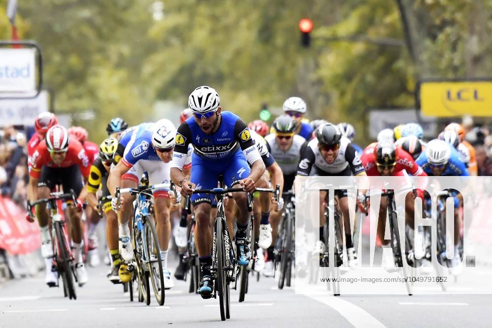 Paris-Tours 2016 cycling race TOURS, FRANCE - OCTOBER 9 : GAVIRIA RENDON Fernando (COL) Rider of ETIXX - QUICK STEP celebrates the victory before DEMARE Arnaud (FRA) Rider of FDJ and VANGENECHTEN Jonas (BEL) Rider of IAM CYCLING during the 110th edition of the Paris-Tours cycling race with start in Dreux and finish in Tours on October 09, 2016 in Tours, France, 9 10 2016 TOURS FRANCE