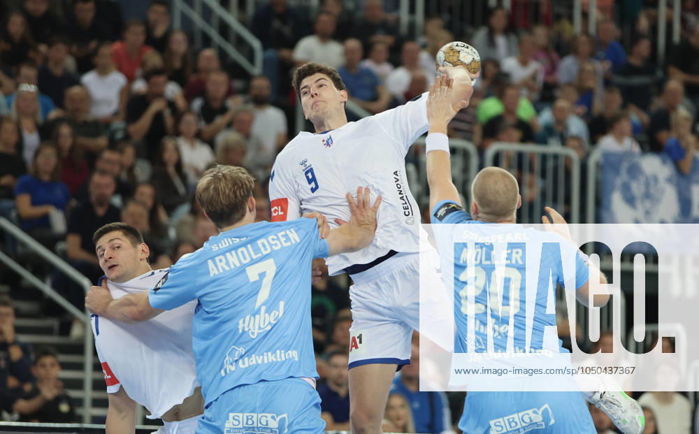 HC Zagreb v Aalborg Handbold - EHF Champions League ZAGREB, CROATIA - SEPTEMBER 18: Luka Lovre Klarica of HC Zagreb is challenged by Felix Moller of Aalborg Handbold and Thomas Arnoldsen of Aalborg Handbold during EHF Champions League Group Phase match between HC Zagreb and Aalborg Handbold at Arena Zagreb on September 18, 2024 in Zagreb, Croatia. SanjinxStrukic PIXSELL