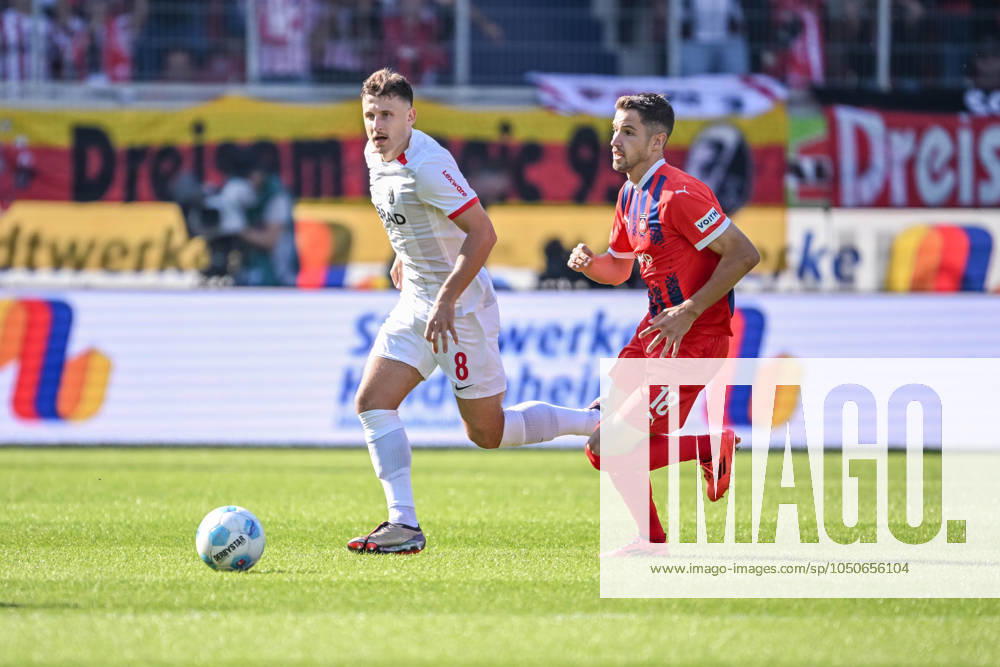 Maximilian Eggestein SC Freiburg and Marvin Pieringer 1 FC Heidenheim in a duel during the Bundesliga match between 1 FC Heidenheim 1846 and SC Freiburg, Voith Arena on September 21, 2024 in Heidenheim, Germany Photo by Harry Langer DeFodi Images Maximilian Eggestein SC Freiburg and Marvin Pieringer 1 FC Heidenheim battle for the ball during the Bundesliga match between 1 FC Heidenheim 1846 and SC Freiburg at Voith Arena on September 21, 2024 in Heidenheim, Germany Photo by Harry Langer DeFodi Images DFL regulations prohibit any use of photographs as image sequences and or quasi video Defodi 541 FCHSCF20240920 019 Defodi-541 DFL regulations prohibit any use of photographs as image sequences and or quasi-video.